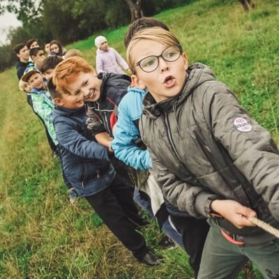 Children playing tug of war.